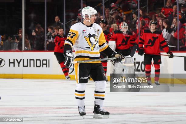 Sidney Crosby of the Pittsburgh Penguins warms up prior to the game against the New Jersey Devils at the Prudential Center on March 19, 2024 in...
