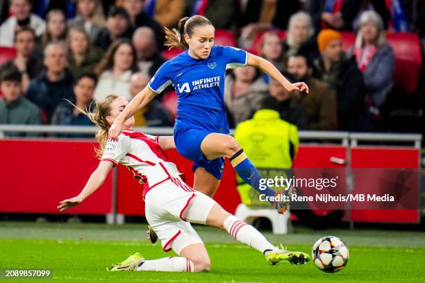 Milicia Keijzer of AFC Ajax challenges Guro Reiten of Chelsea during the UEFA Women's Champions League 2023/24 Quarter Final Leg One match between...