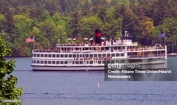 Times Union staff photo by John Carl D'Annibale: The Lac du Saint Sacrement sails past Lake George Village Thursday afternoon May 24, 2007. FOR...