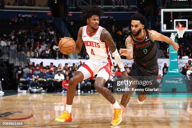 Jalen Green of the Houston Rockets dribbles the ball during the game against the Washington Wizards on March 19, 2024 at Capital One Arena in...