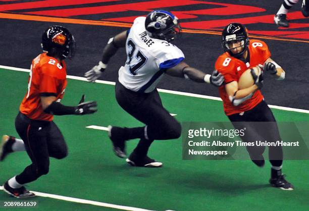 Albany Firebirds's, Athony Rodriquez ,at right, breaks away from Mahoning Valley Thunder defender Frashon McGee during an arenafootball 2 game...