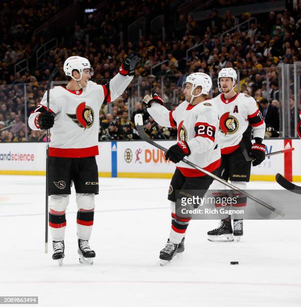 Shane Pinto of the Ottawa Senators celebrates his goal against the Boston Bruins during the second period at the TD Garden on March 19, 2024 in...