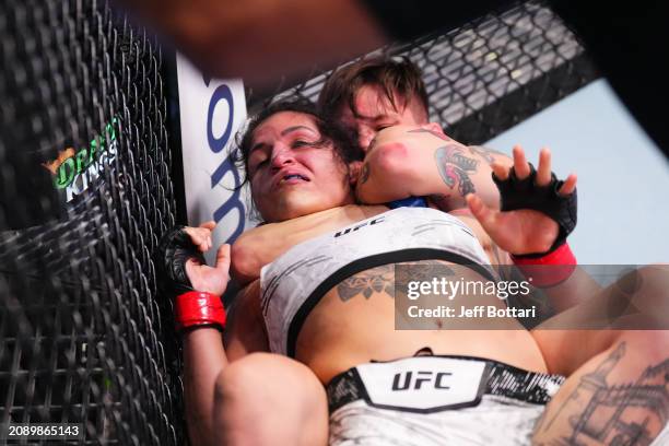 Macy Chiasson submits Pannie Kianzad of Iran in their women's bantamweight fight during the UFC Fight Night event at UFC APEX on March 16, 2024 in...