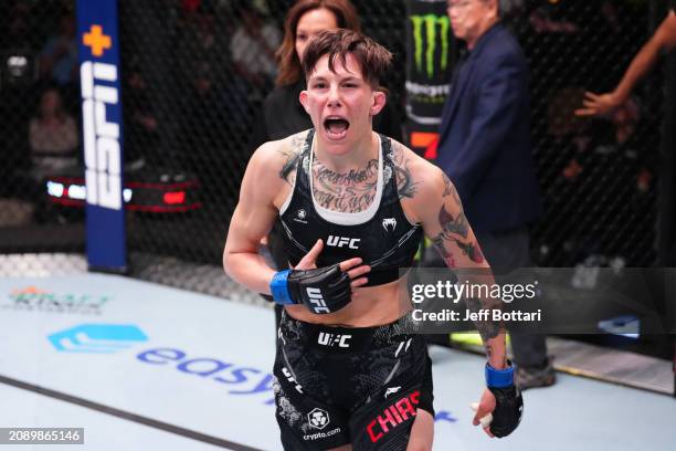 Macy Chiasson reacts after her submission victory over Pannie Kianzad of Iran in their women's bantamweight fight during the UFC Fight Night event at...