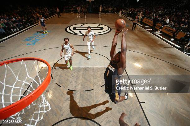 Zion Williamson of the New Orleans Pelicans dunks the ball during the game against the Brooklyn Nets on March 19, 2024 at Barclays Center in...