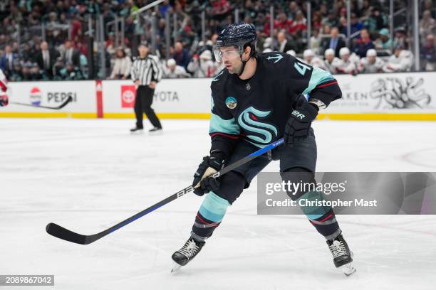 Justin Schultz of the Seattle Kraken skates during the second period of a game against the Washington Capitals at Climate Pledge Arena on March 14,...