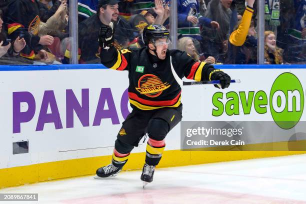 Conor Garland of the Vancouver Canucks celebrates after scoring a goal against the Buffalo Sabres during the first period of their NHL game at Rogers...