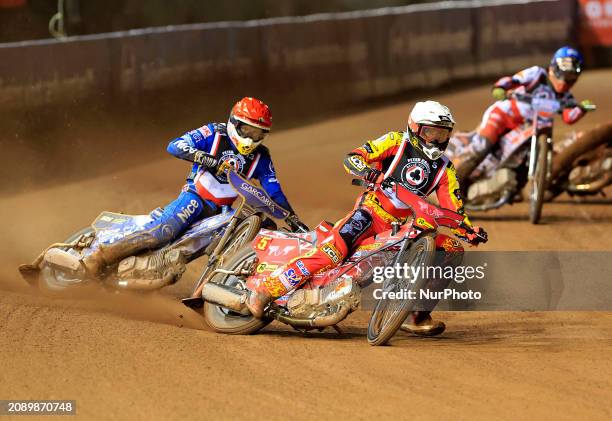 Max Fricke of the Leicester Lions is leading Robert Lambert during the Peter Craven Memorial Trophy meeting at the National Speedway Stadium in...
