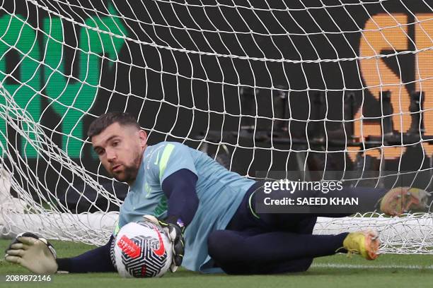 Australia's goalkeeper Mathew Ryan takes part in a training session at the CommBank Stadium in Sydney on March 20 ahead of the 2026 World Cup...