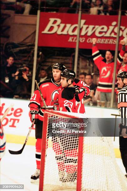 Right Wing Randy McKay of the New Jersey Devils celebrates a goal with Center Scott Gomez in the game between the New Jersey Devils vs the New York...