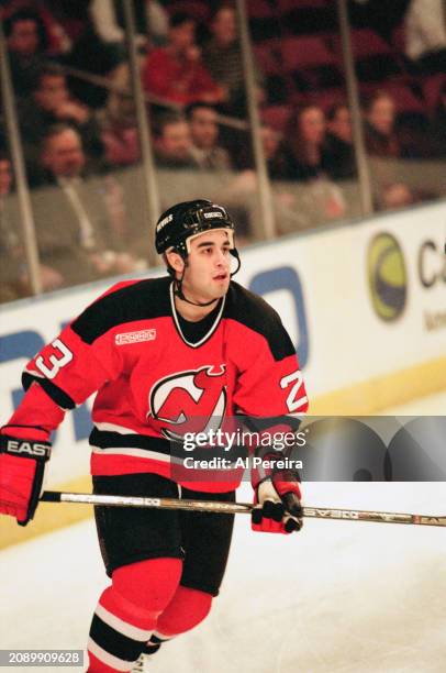 Center Scott Gomez of the New Jersey Devils skates in the game between the New Jersey Devils vs the New York Rangers at Madison Square Garden on...