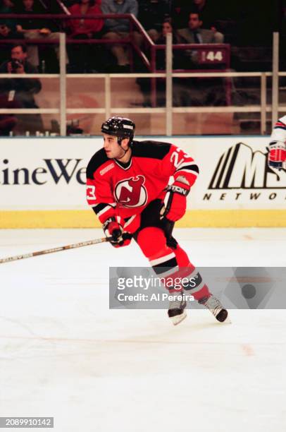 Center Scott Gomez of the New Jersey Devils skates in the game between the New Jersey Devils vs the New York Rangers at Madison Square Garden on...