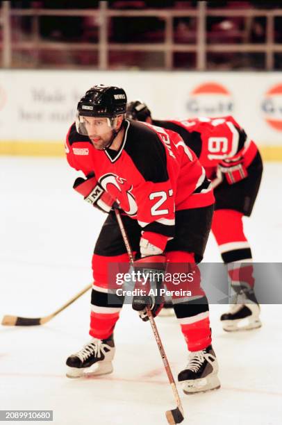 Defenseman Scott Niedermayer of the New Jersey Devils waits on the puck drop in the game between the New Jersey Devils vs the New York Rangers at...