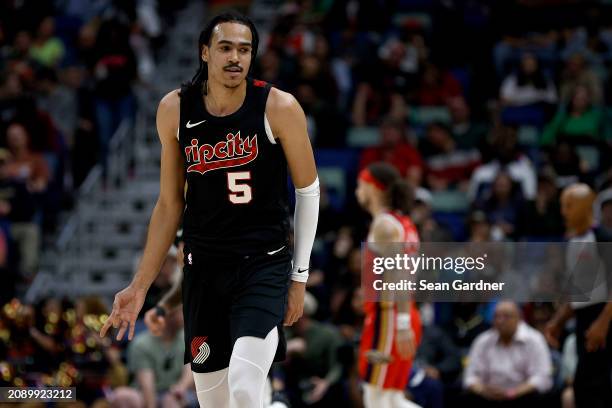 Portland Trail Blazers guard Dalano Banton reacts after scoirng a three point basket during the first quarter of an NBA game against the New Orleans...