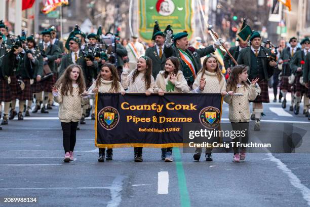 Participants from County Cork Pipes & Drums march in the St. Patrick's Day Parade on March 16, 2024 in New York City.