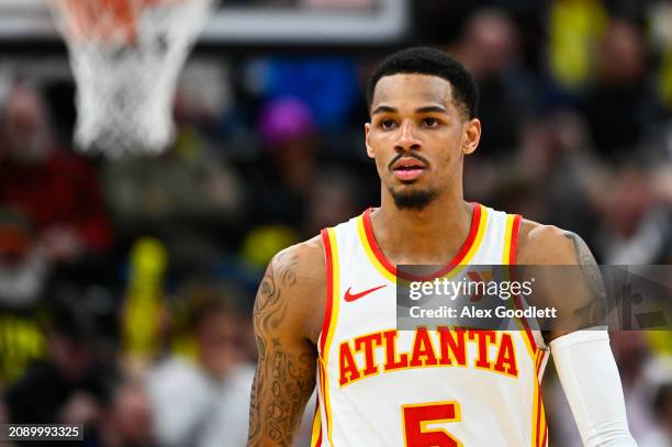 Dejounte Murray of the Atlanta Hawks looks on during the second half of a game against the Utah Jazz at Delta Center on March 15, 2024 in Salt Lake...