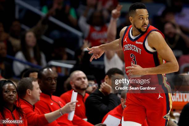 New Orleans Pelicans guard CJ McCollum reacts after scoring a three point basket during the fourth quarter of an NBA game against the Portland Trail...
