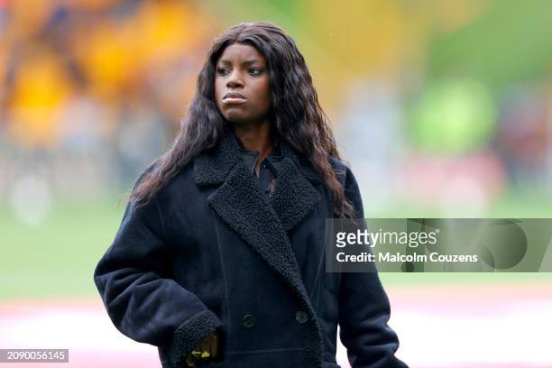 Sport pundit Eni Aluko looks on during the Emirates FA Cup Quarter Final between Wolverhampton Wanderers and Coventry City at Molineux on March 16,...