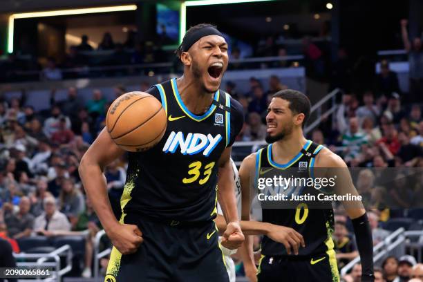 Myles Turner of the Indiana Pacers reacts after a dunk during the second half in the game against the Brooklyn Nets at Gainbridge Fieldhouse on March...