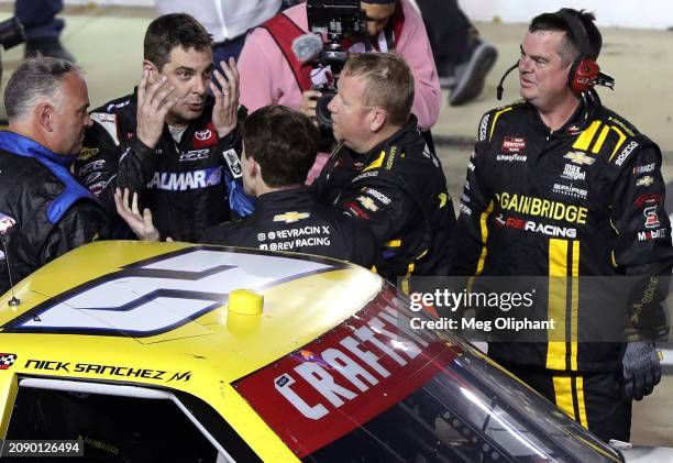 Stewart Friesen, driver of the Halmar International Toyota, and Nick Sanchez, driver of the Gainbridge Chevrolet, have a heated conversation on the...