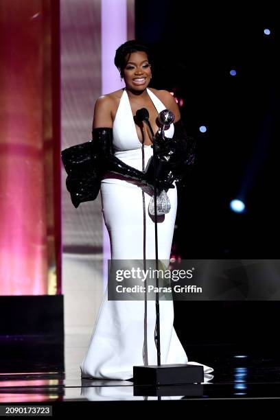 Fantasia Barrino accepts the Outstanding Actress in a Motion Picture award onstage during the 55th NAACP Image Awards at Shrine Auditorium and Expo...