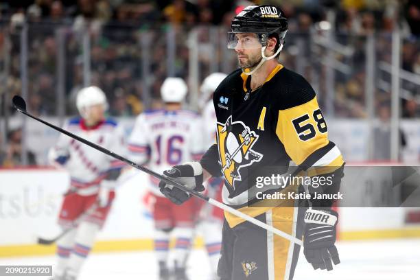 Kris Letang of the Pittsburgh Penguins during the game against the New York Rangers at PPG PAINTS Arena on March 16, 2024 in Pittsburgh, Pennsylvania.