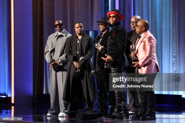 Johnny Gill, Ricky Bell, Ralph Tresvant, Bobby Brown, Ronnie DeVoe and Michael Bivins of New Edition accept the Hall of Fame Award onstage during the...