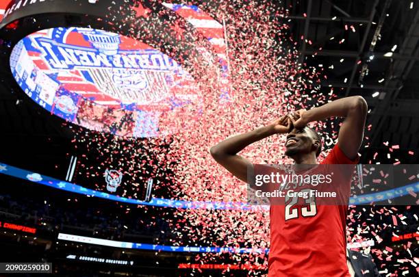 Mohamed Diarra of the North Carolina State Wolfpack celebrates after winning the Championship Game of the ACC Men's Basketball Tournament 84-76...