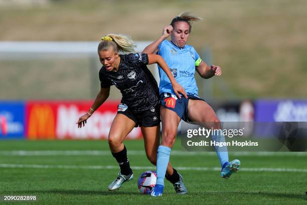 Alyssa Whinham of the Phoenix is tackled by Mackenzie Hawkesby of Sydney FC during the A-League Women round 20 match between Wellington Phoenix and...