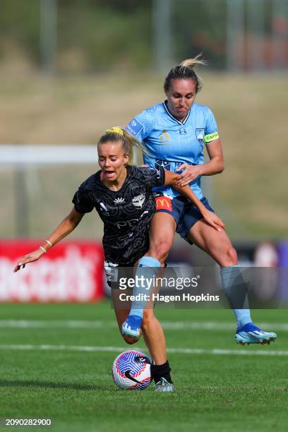 Alyssa Whinham of the Phoenix is tackled by Mackenzie Hawkesby of Sydney FC during the A-League Women round 20 match between Wellington Phoenix and...