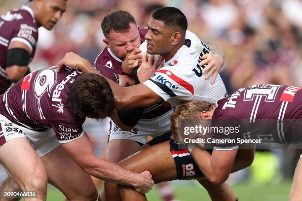 Daniel Tupou of the Roosters is tackled during the round two NRL match between Manly Sea Eagles and Sydney Roosters at 4 Pines Park, on March 17 in...