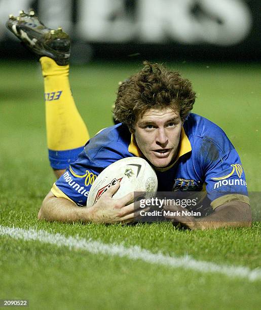 Ashley Graham of the Eels scores a try during the round 14 NRL match between the Parramatta Eels and the Warriors at Parramatta Stadium June 14, 2003...