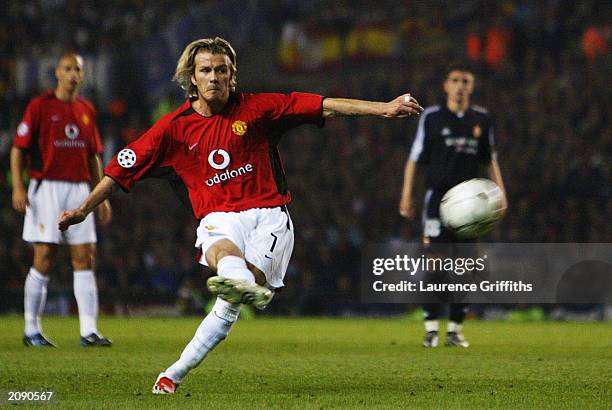 David Beckham of Manchester United scores the third goal from a free kick during the UEFA Champions League quarter final, second leg match between...