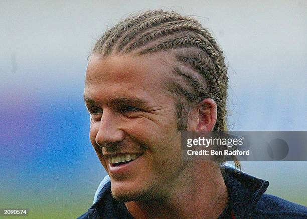David Beckham of England looks on during the England training session at ADSL Stadium on May 20, 2003 in Durban, South Africa. On June 17, 2003...