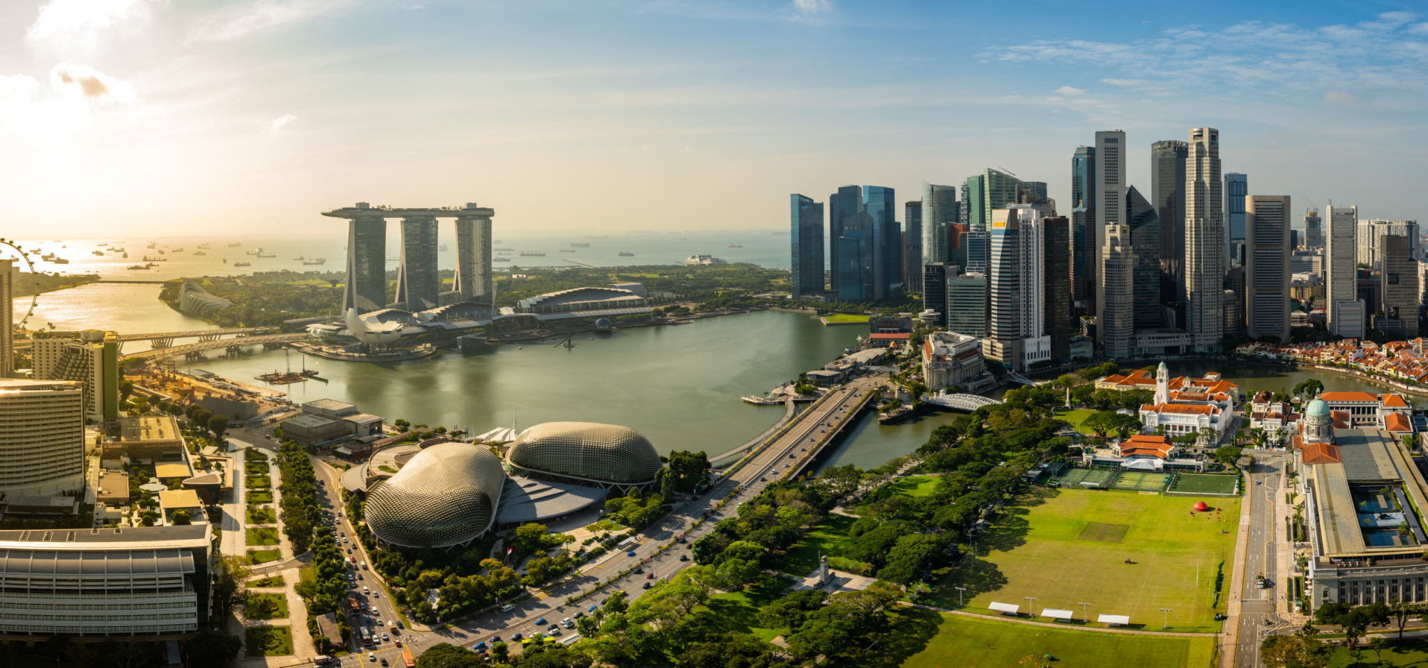 Panoramic View of the Singapore City Skyline at Sunrise Panoramic View of the Singapore City Skyline at Sunrise