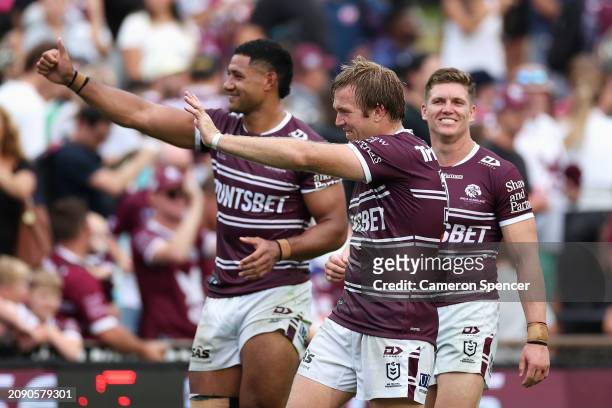Jake Trbojevic of the Sea Eagles and team mates celebrate winning the round two NRL match between Manly Sea Eagles and Sydney Roosters at 4 Pines...