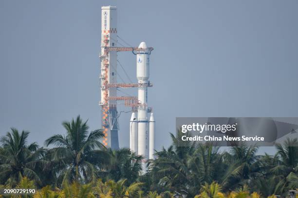 The combination of the relay satellite Queqiao-2 and the Long March-8 Y3 carrier rocket is transferred to the launch pad at the Wenchang Space Launch...