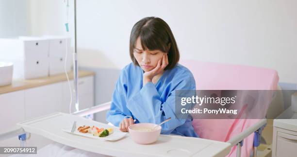 patient no appetite on bed - no appetite stock pictures, royalty-free photos & images