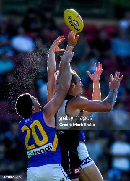 Jeremy Finlayson of the Power is spoiled by Jeremy McGovern of the Eagles during the round one AFL match between Port Adelaide Power and West Coast...