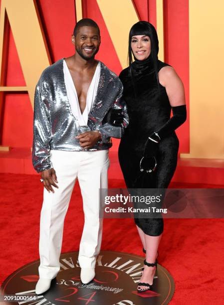 Usher and Jennifer Goicoechea attend the 2024 Vanity Fair Oscar Party hosted by Radhika Jones at the Wallis Annenberg Center for the Performing Arts...