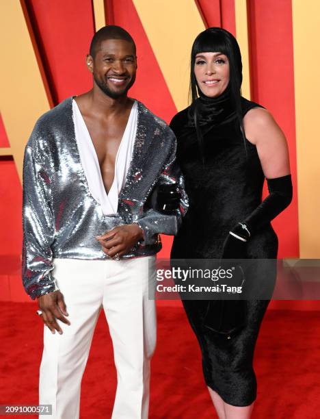 Usher and Jennifer Goicoechea attend the 2024 Vanity Fair Oscar Party hosted by Radhika Jones at the Wallis Annenberg Center for the Performing Arts...