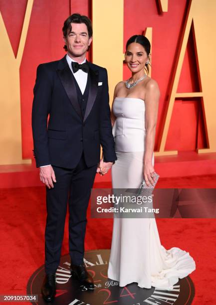John Mulaney and Olivia Munn attend the 2024 Vanity Fair Oscar Party hosted by Radhika Jones at the Wallis Annenberg Center for the Performing Arts...