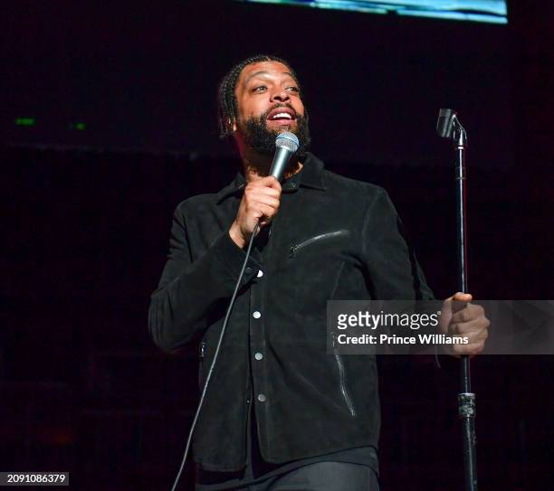 Comedian DeRay Davis performs Onstage during "We Them One's Comedy Tour" at State Farm Arena on March 16, 2024 in Atlanta, Georgia.