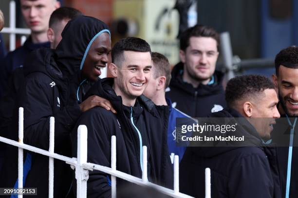 Tom Lawrence of Rangers looks on as a pitch inspection takes place during the Cinch Scottish Premiership match between Dundee FC and Rangers FC at...