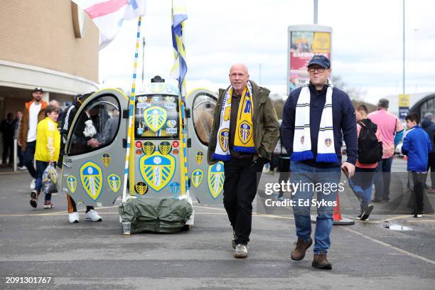 Leeds United fans arrive at the stadium prior to the Sky Bet Championship match between Leeds United and Millwall at Elland Road on March 17, 2024 in...