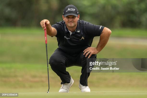Patrick Reed of the United States lines up his putt on hole 9 during the final round of International Series Macau at Macau Golf and Country Club on...