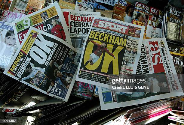 All the Barcelona's newspaper display the same news 11 June 2003 about the possible incorporation of the Manchester United British player David...