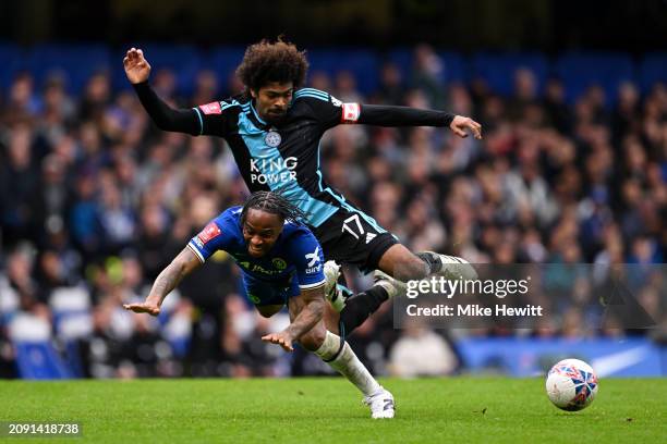 Raheem Sterling of Chelsea is challenged by Hamza Choudhury of Leicester City during the Emirates FA Cup Quarter Final between Chelsea FC and...