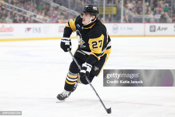 Ryan Graves of the Pittsburgh Penguins during the game against the New York Rangers at PPG PAINTS Arena on March 16, 2024 in Pittsburgh, Pennsylvania.