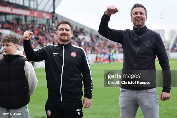 Paul Freier, assistant coach and head coach Christoph Dabrowski of Essen celebrate the 4-0 victory after the 3. Liga match between Rot-Weiss Essen...